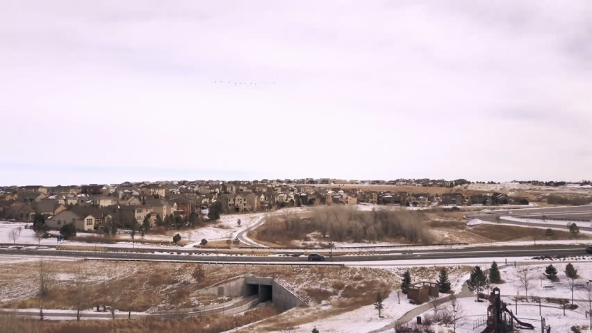 Aerial of residential neighborhood of Suburbia in the Winter.