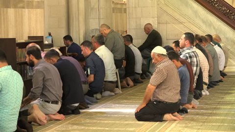 NABLUS, WEST BANK - OCTOBER 2016: Palestinian Muslims pray inside a mosque in Nablus, a city in the West Bank