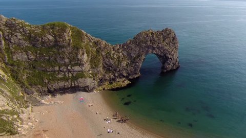 4 in 1. Durdle Door A Natural Stone Arch. England. Aerial view. Part 1.