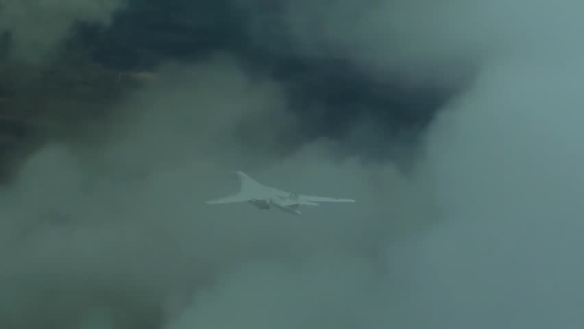 Tu-160 is flying over the clouds