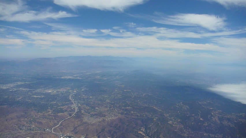 Flying in airplane over Los Angeles, California. More in series available.