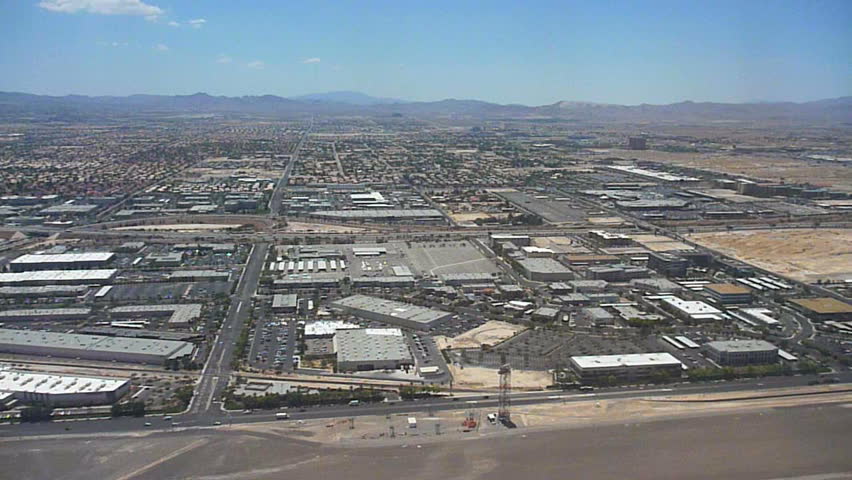 Taking off in Las Vegas, Nevada. Aerial of Las Vegas developing business and