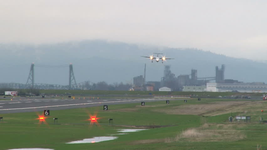 Airplane lands at Portland Oregon airport.