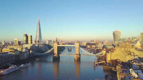 Aerial cityscape view of London and the River Thames, England, United Kingdom - Crane up video