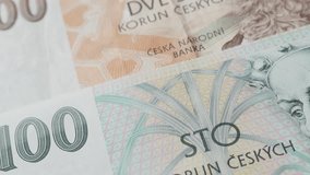 National currency of Czech Republic koruna different values 4K 2160p 30fps UltraHD footage - Mixed denominations of Czechia crown paper banknotes 3840X2160 UHD tilt video
