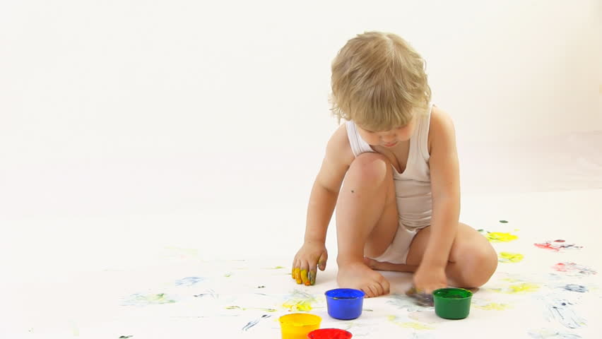 boy painter in the studio