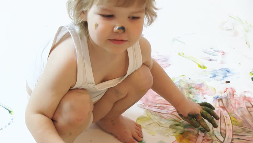 boy painter in the studio