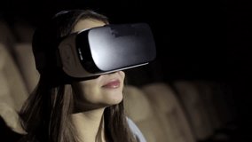 Woman looking video in glasses virtual reality. clouse-up.