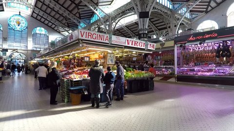 VALENCIA, SPAIN - JANUARY 12, 2017: Inside the Mercado Central of Valencia. The Mercado Central is a public market that sells fresh food of all types. Construction of the market was completed in 1928.