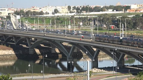RABAT, MOROCCO - DECEMBER 2016: A streetcar (tram) crosses the river in Rabat, Morocco's capital city