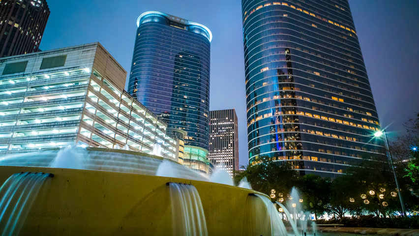 Houston Skyline time lapse at night 4K 1080p with buildings and water fountain