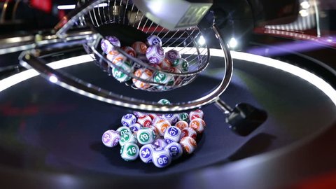 Colourful lottery balls in a lotto machine. Gambling machine and euqipment.