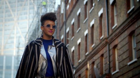 Stylish Fashion Blogger Walking Along Urban Street Video Stok