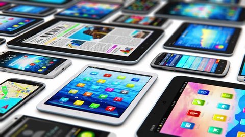 Group of tablet computer PC and modern touchscreen smartphones or mobile phones with various internet applications and web apps with color interface and colorful icons and buttons with selective focus