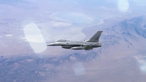 4k, F-16 fighter jet, flying high over the desert.