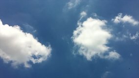 compilation of 8 clips time lapse of clouds and blue sky