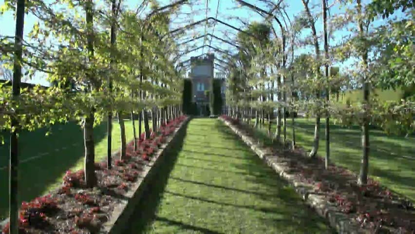 DUNEDIN, NEW ZEALAND â CIRCA MAY 2012: View through garden arch trellis of