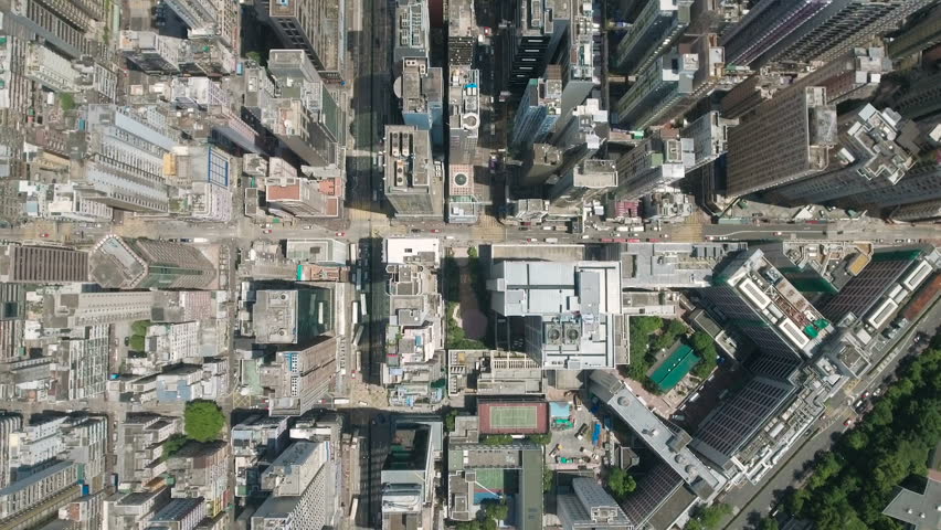 Abstract aerial drone footage of rooftops and streets in the densely populated Kowloon area in Hong Kong, one of Asia's most iconic modern cities.
 | Shutterstock HD Video #23168224