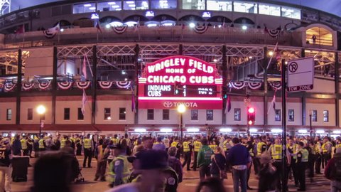Chicago, Illinois - October 29th, 2016: Historic Wrigley Field during game 4 of the 2016 Major League Baseball World Series at the corner of Clark and Addison. Cubs vs. Indians 4K time lapse zoom out