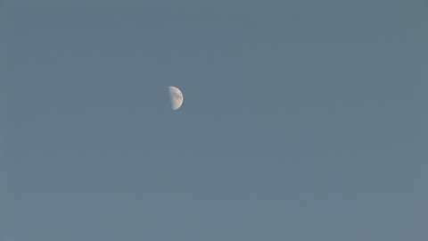 Half moon against a blue sky, zoom in. Format: NTSC HDV Compression: MotionJPEG-A Camera: Sony HVR-Z1U Size: 1080i (1920 x 1080) Sound: No