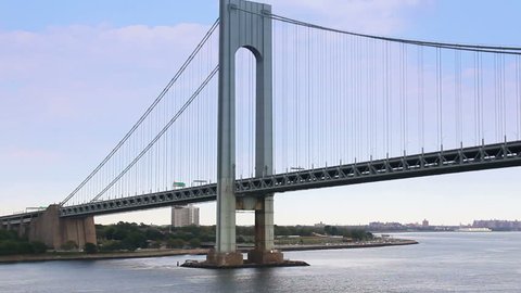 Time lapse shot traveling under the Verrazano-Narrows Bridge in New York Harbor near New York City.