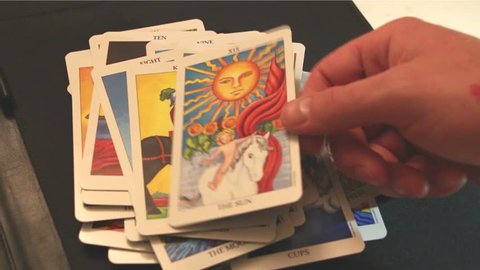 Tarot Cards Being Flipped Over (2 of 5)