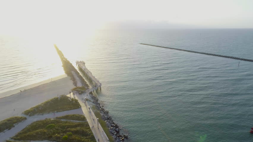 Pedestrian Walkway on South Pointe Park Miami South Beach Morning Sunlight - Aerial View Dropping From Sky