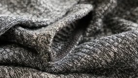 Modern sweater for women knitting texture details slow tilt 4K 2160p 30fps UltraHD  footage - Gathers of bicolor knitwork shallow DOF 3840X2160 UHD tilting video - Powered by Shutterstock - Get 15% off with code: PIKWIZARD15