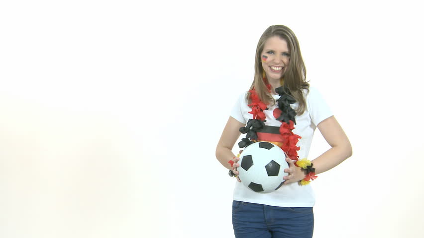 Attractive German soccer fan girl throws soccer ball