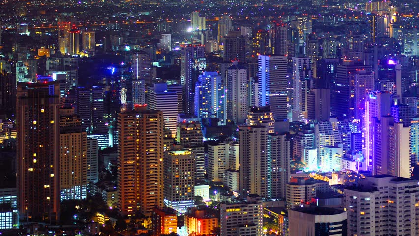The city has a very tall building at night with a light house in Bangkok, Thailand. | Shutterstock HD Video #2319872