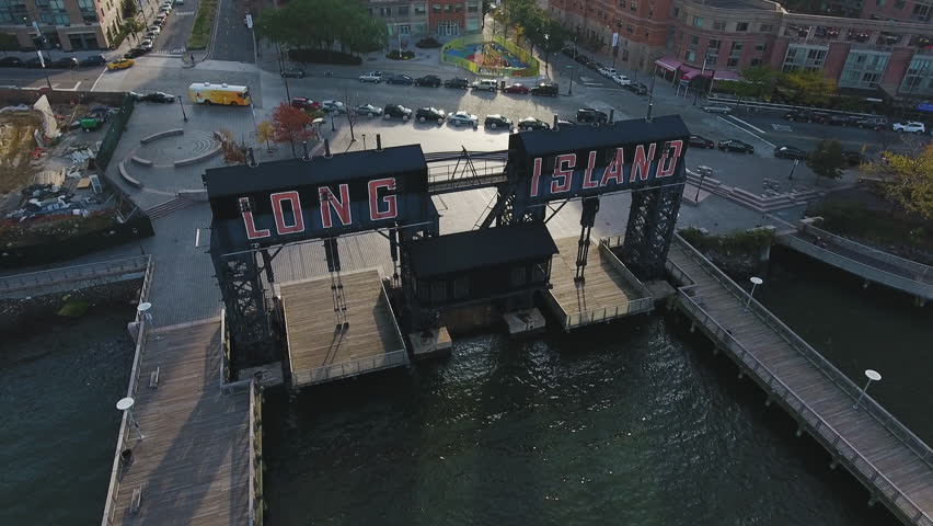 An establishing, aerial shot of Long Island City, a neighborhood in Queens, NY. Shot at sunrise during the autumn of 2016.