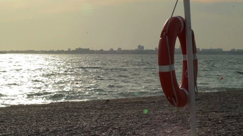 Rescue buoy on the beach. Lifebuoy.