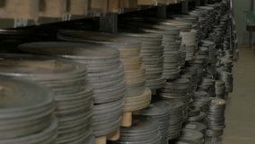 Vintage reel, video or audio tapes in a old media archives shelfs.