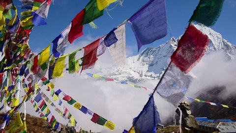 Machapuchare peak and prayer flags from Annapurna basecamp ,Nepal.