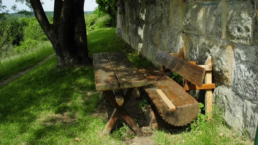 park-bench at a medieval abbey wall