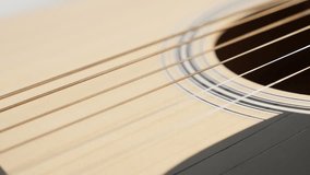 Slow motion of plucked D string vibration on instrument body 1920X1080 HD footage - Wooden acoustic guitar shallow DOF slow-mo 1080p FullHD video