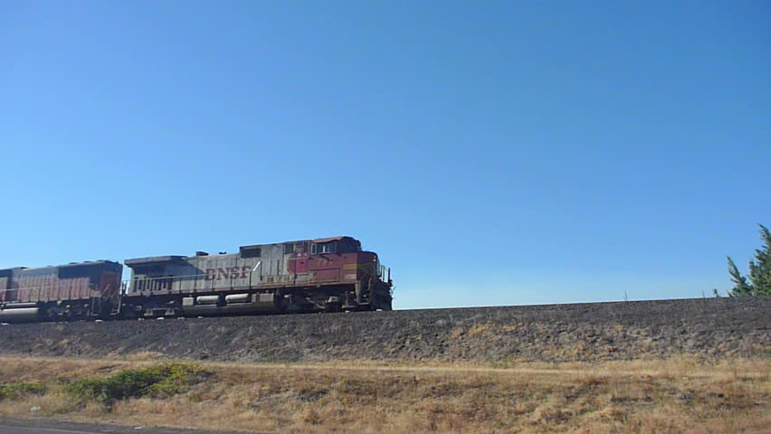 VANCOUVER, WASHINGTON - CIRCA JANUARY 2012: Train passes by on high railroad