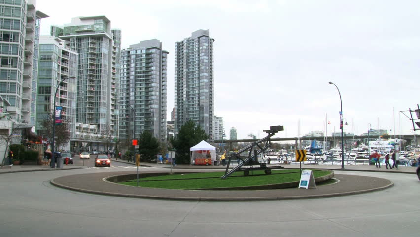 VANCOUVER, BRITISH COLOMBIA - CIRCA 2012: City scenic with large yacht in