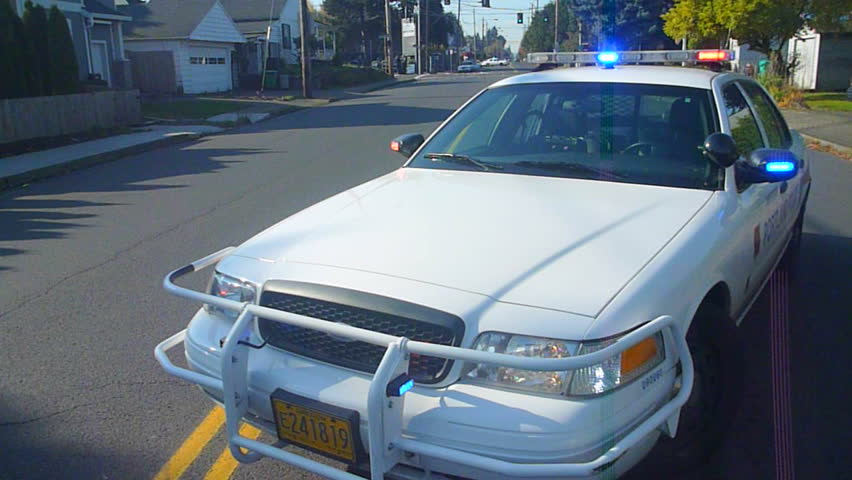 PORTLAND, OREGON - CIRCA AUGUST 2011: Police car with siren lights flashing