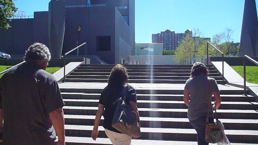 MINNEAPOLIS, MINNESOTA - CIRCA NOVEMBER 2011: Three people walk up stairs in