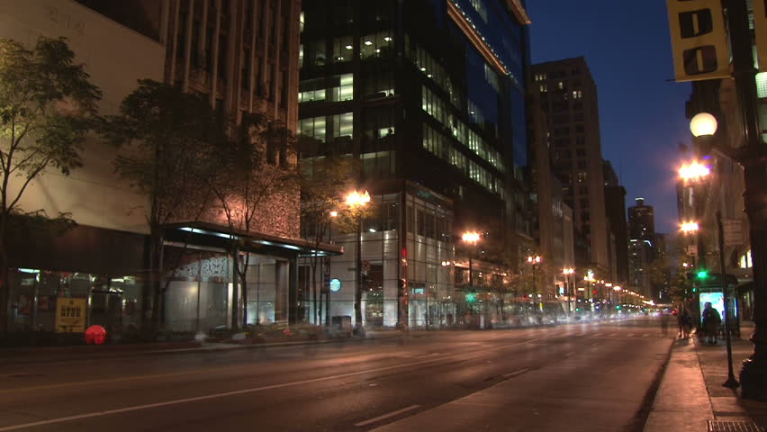 CHICAGO - CIRCA 2011: Time lapse of downtown area with buses and cars driving