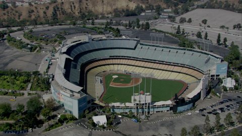 Los Angeles - Circa 2009: Dodger Stadium in 2009. Circling over Dodger Stadium then zooming back the view to see the City of Los Angeles, California.