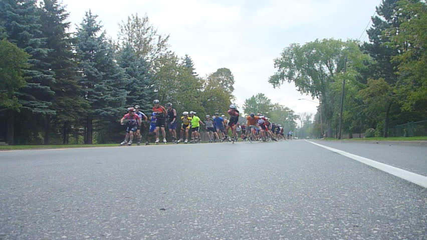 DULUTH, MINNESOTA - CIRCA MAY 2010: Large grouping of inline skaters racing in