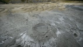 Mud volcanoes also known as mud domes boiling in summer season