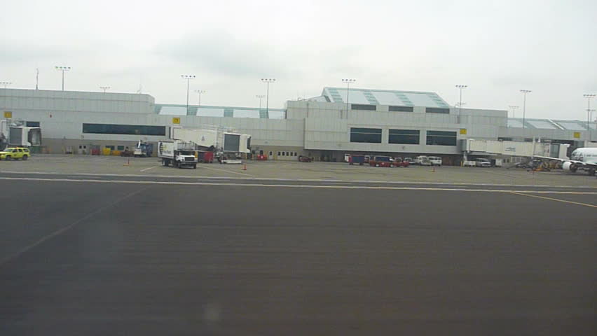 PORTLAND, OREGON - CIRCA MARCH 2010: Airplane taxis on runway in Portland