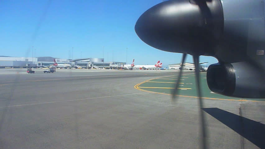 SAN FRANCISCO - CIRCA 2010: Airplane arriving and taxiing runway at San