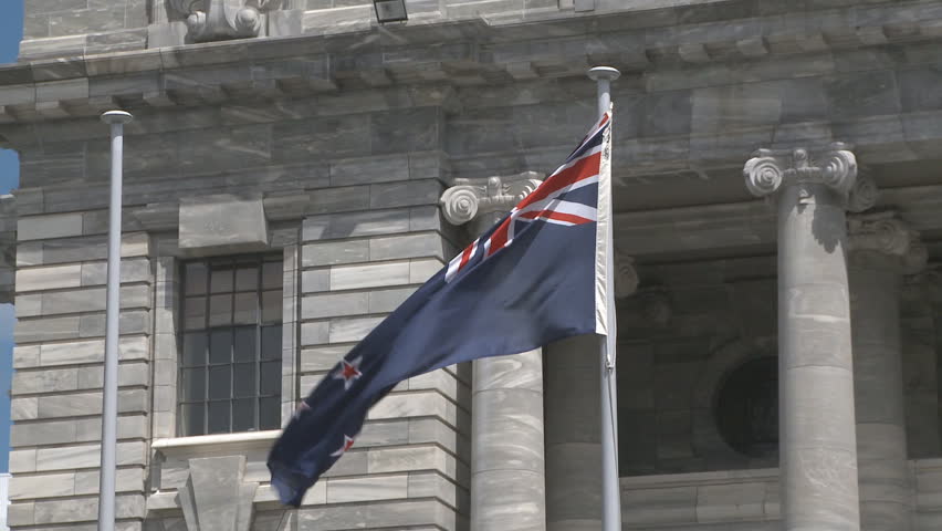New Zealand flag flying outside Parliament Buildings in Wellington, New Zealand