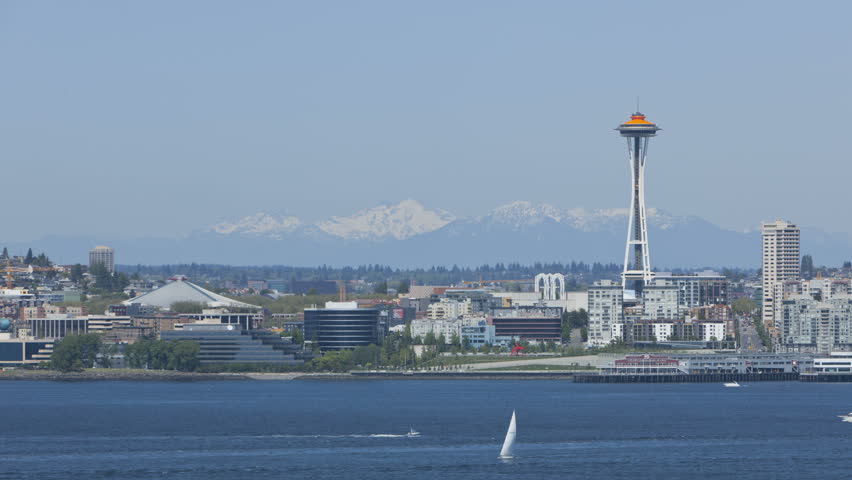 SEATTLE - MAY 11, 2012: Timelapse of Seattle Space Needle with Mountains in the