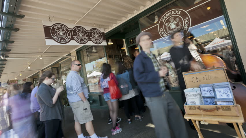 SEATTLE - MAY 12, 2012: Timelapse of the scenery in front the first Starbucks in