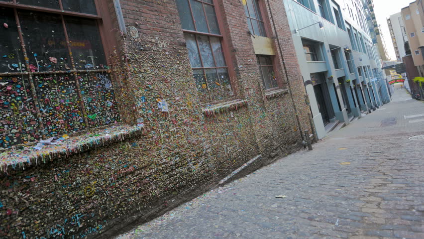 SEATTLE, USA - MAY 12, 2012: Timelapse of People walking by the gum wall on Post